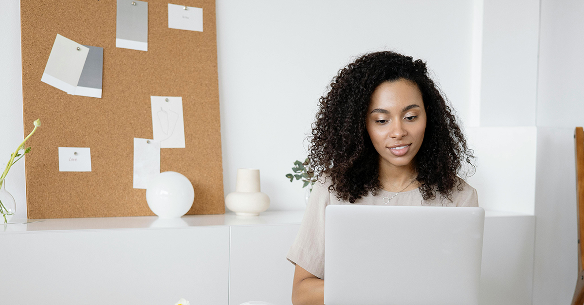 woman managing a webinar on a laptop