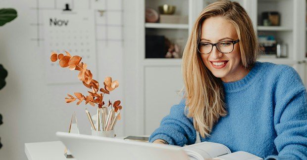 woman researching on a laptop
