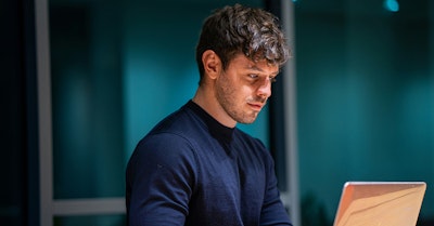 man working on laptop