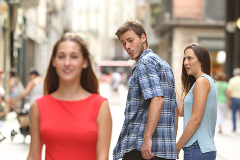 Guy Checks Out Red Dress Girl