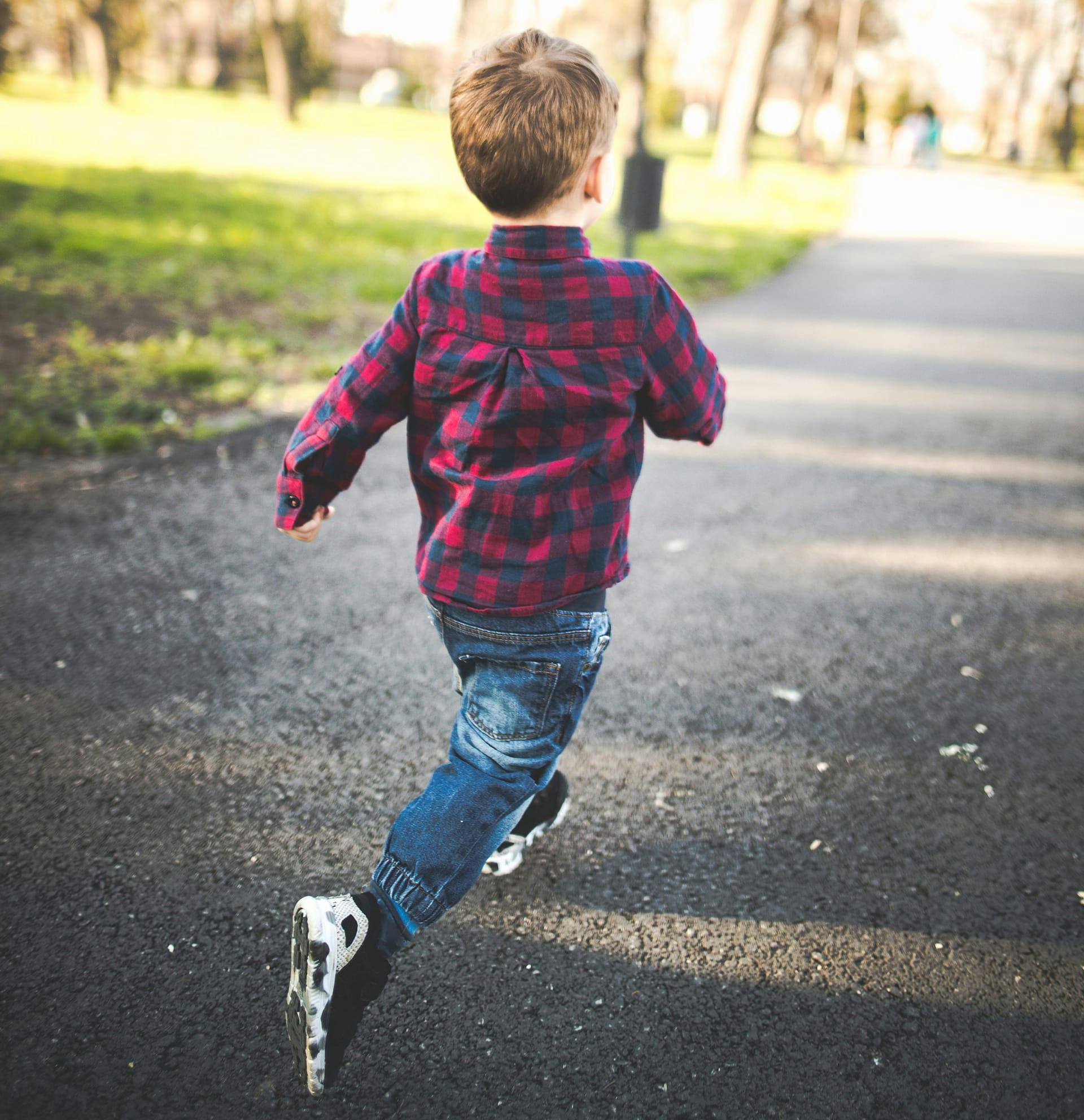 little boy running