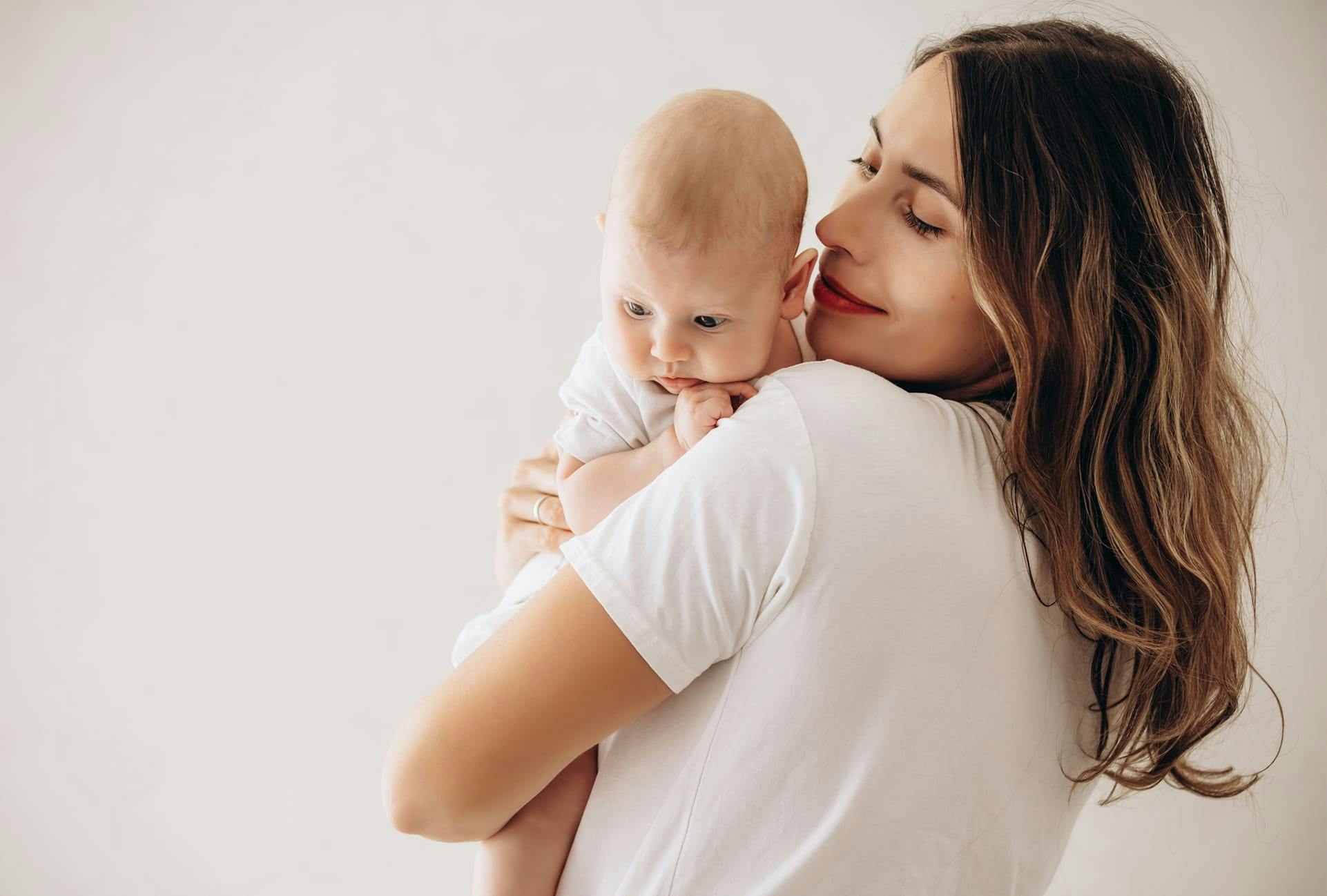 woman holding a baby