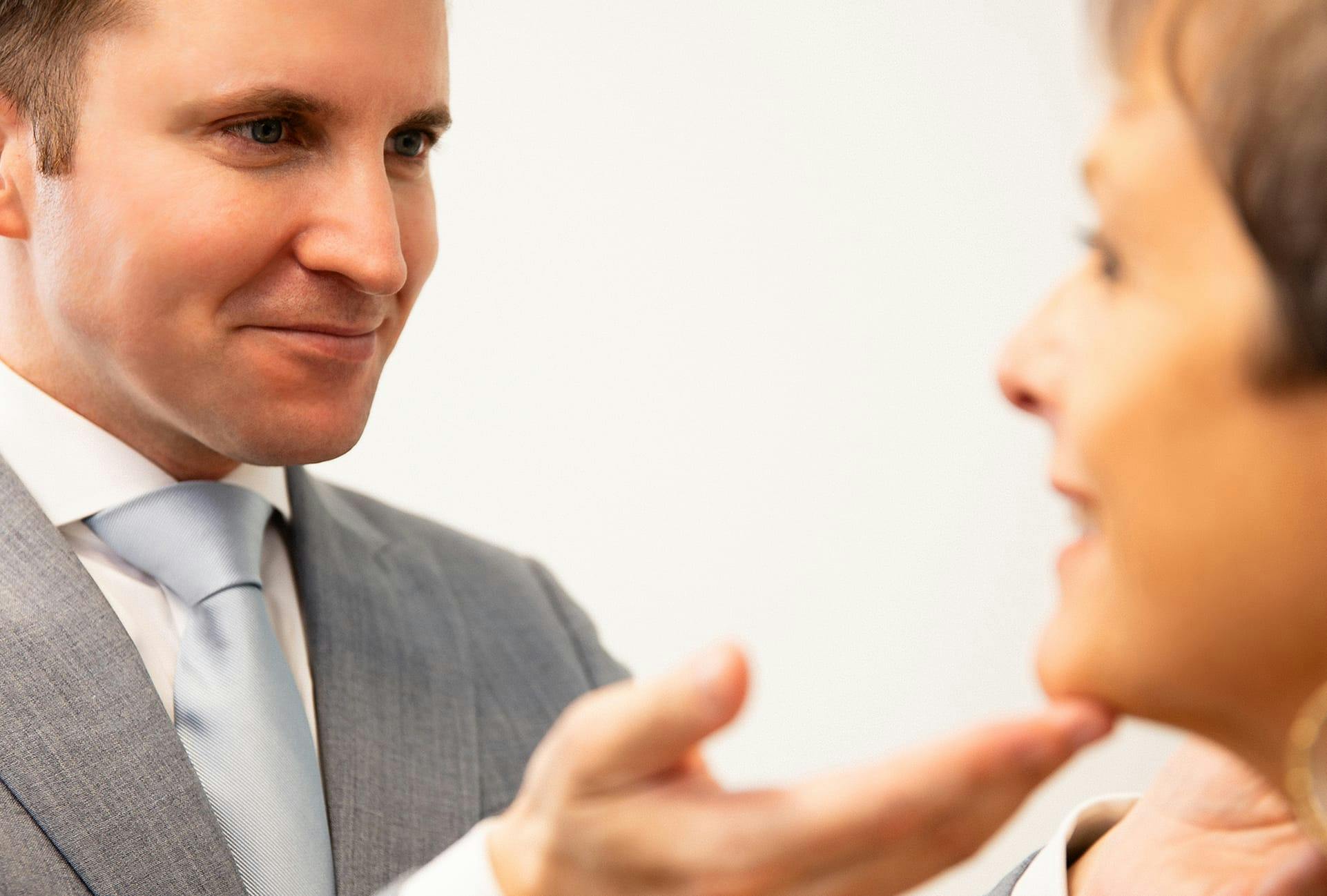 doctor touching lady's face