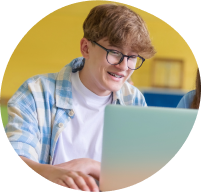 Student excitedly using their computer.