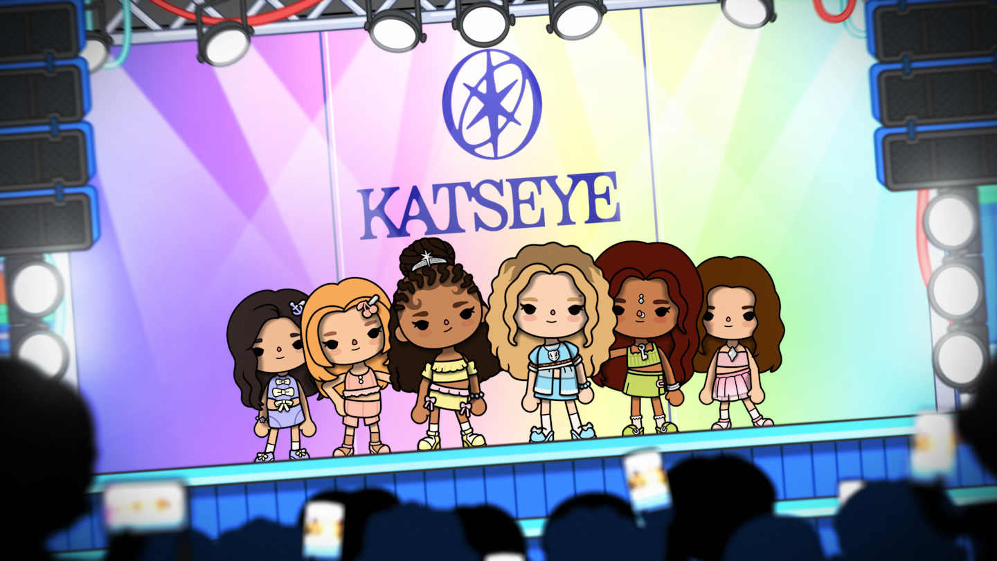 This is an image of the group Katseye standing on stage in Toca Boca World