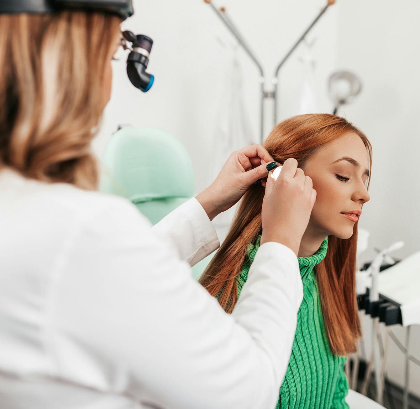 woman getting an ear exam
