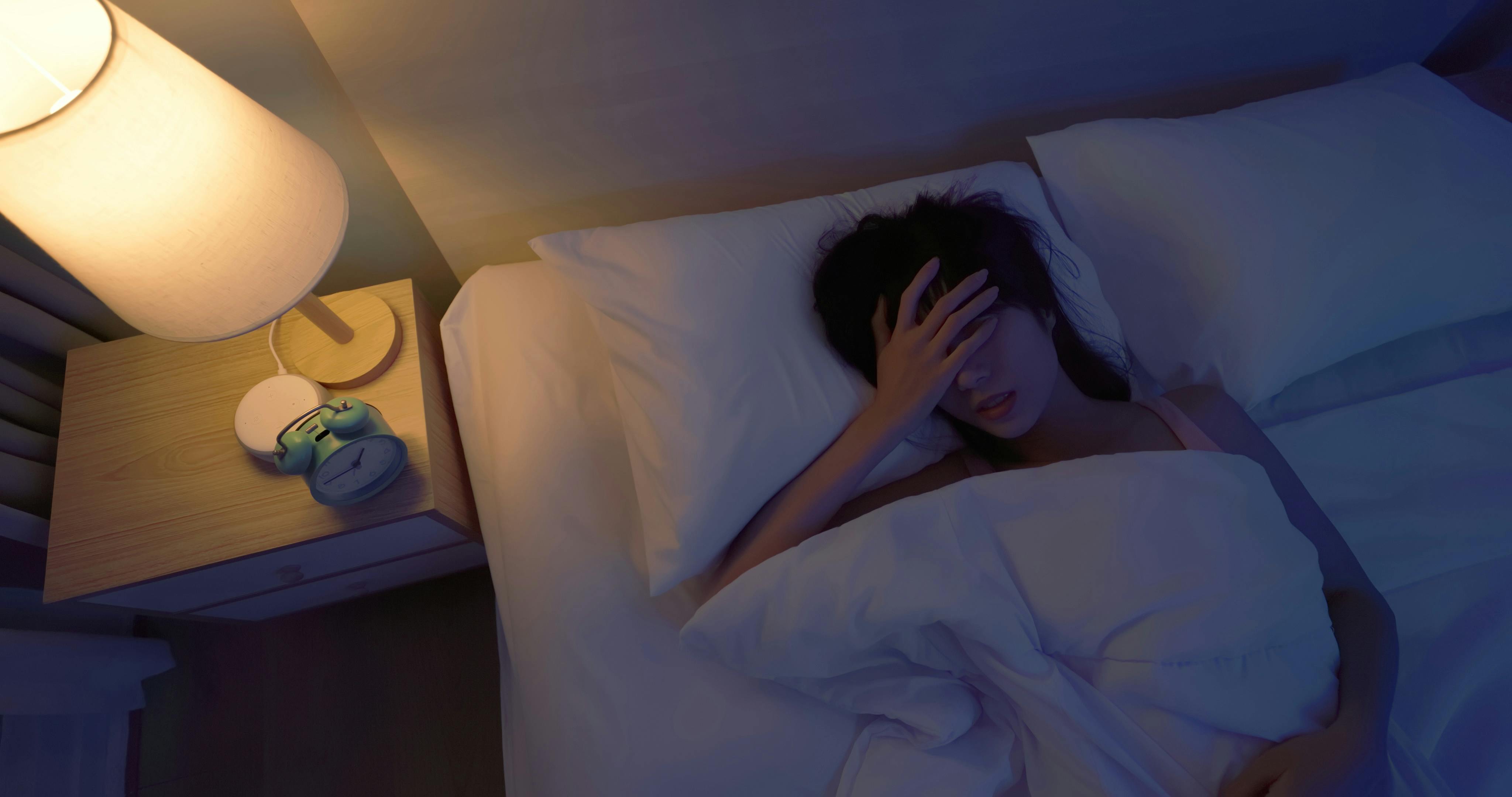 woman having trouble sleeping