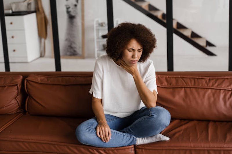 Woman with Laryngitis