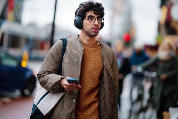 Man Wearing Head Phones