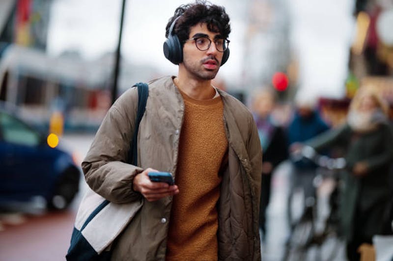Man Wearing Head Phones
