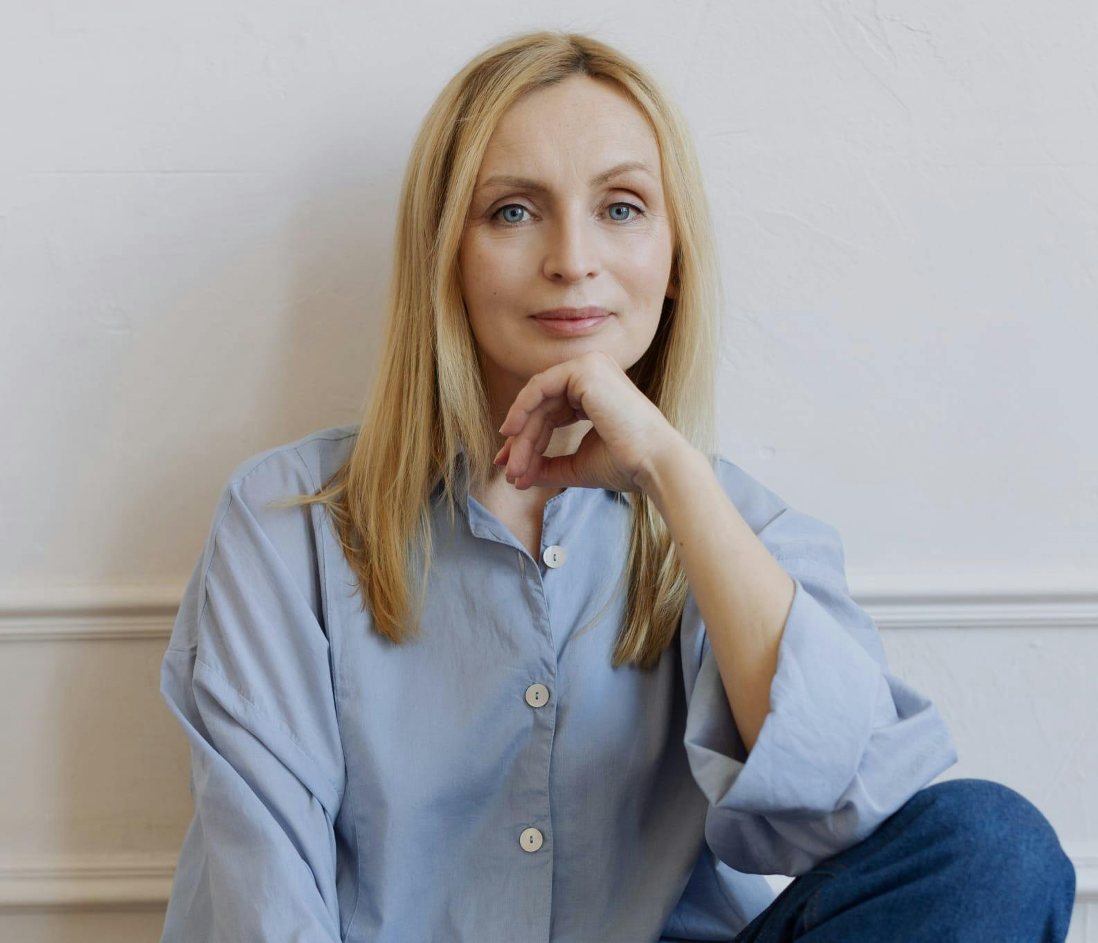 Woman with her hand on her chin