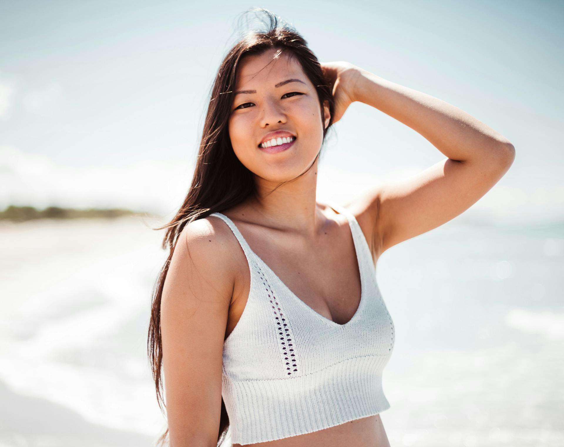 Woman at the beach smiling