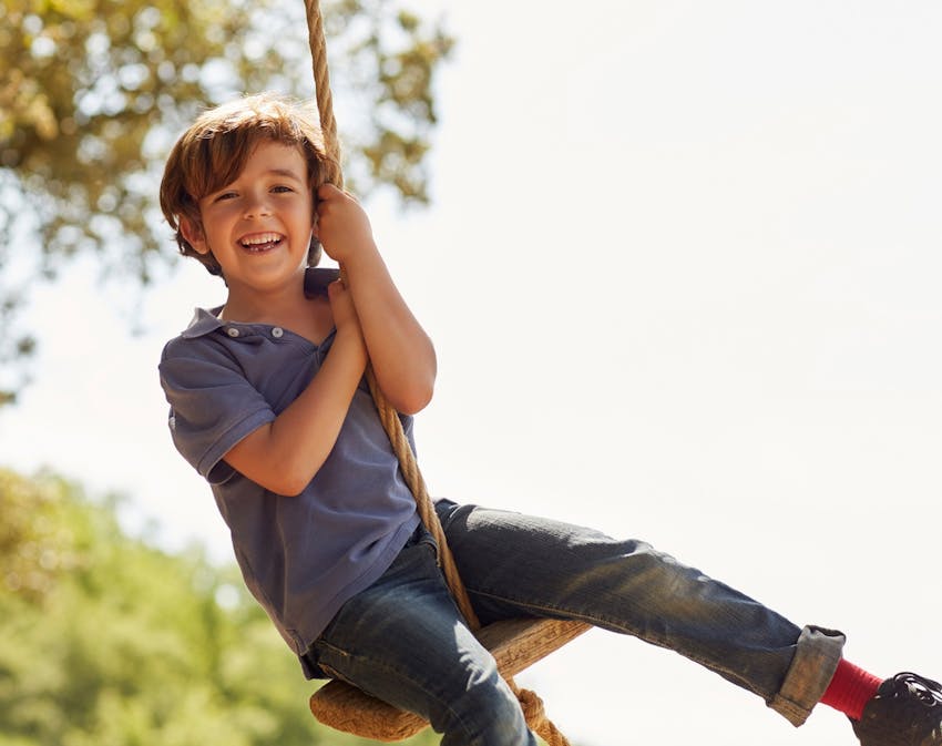 Kid on swing