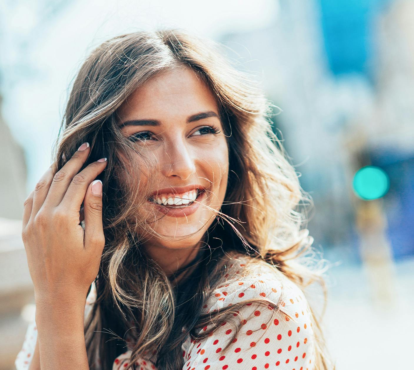 Woman outside smiling