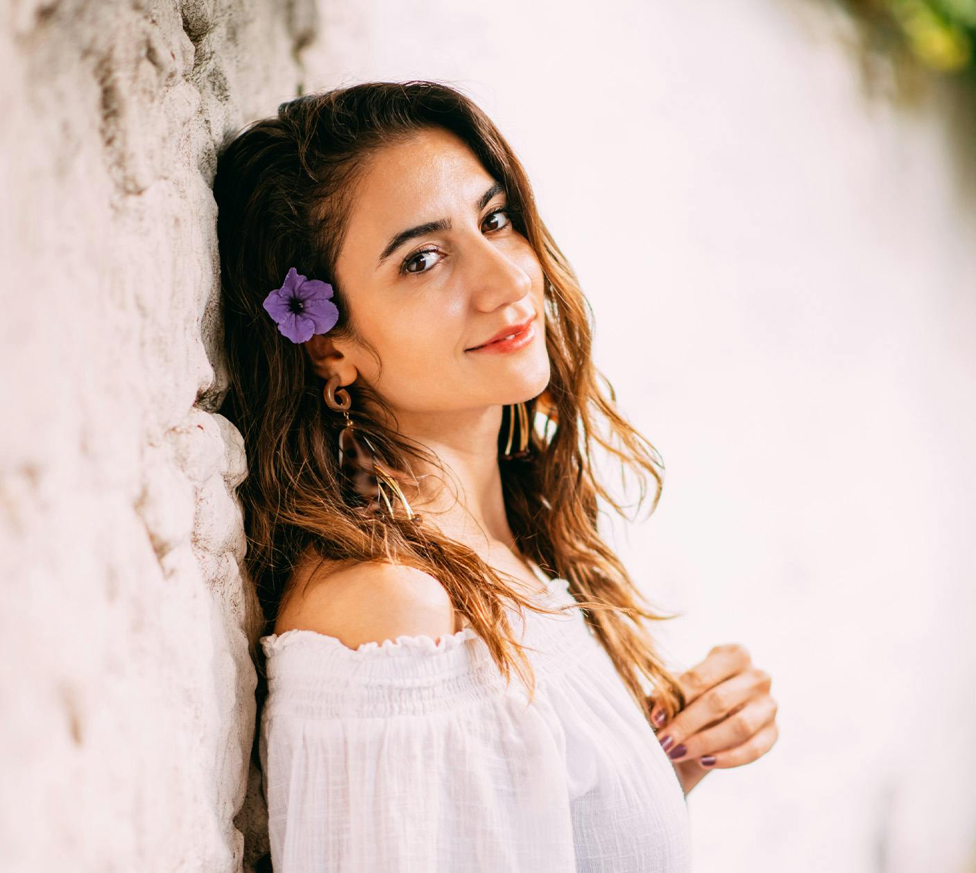 Woman leaning against wall