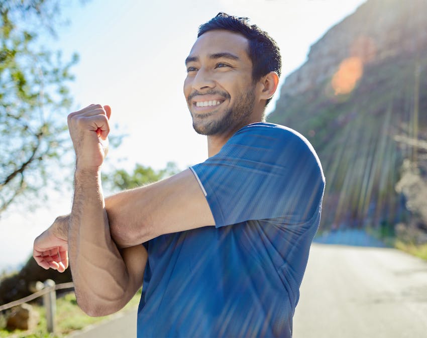 Woman in white smiling