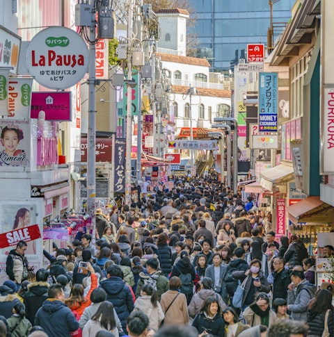 Crowded urban scene at famous Takeshita Street, Harajuku district, Tokyo, Japan