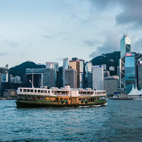Left side view of Star Ferry cruising Sam Chun River in Hong Kong