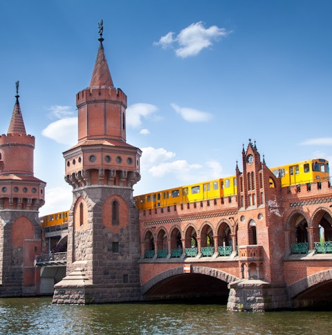 view of The OberbaumBrücke in Berlin on a sunny day with blue sky