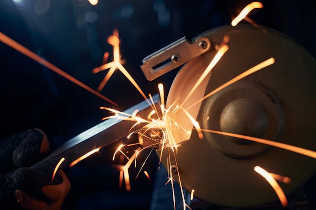 Grinding metal