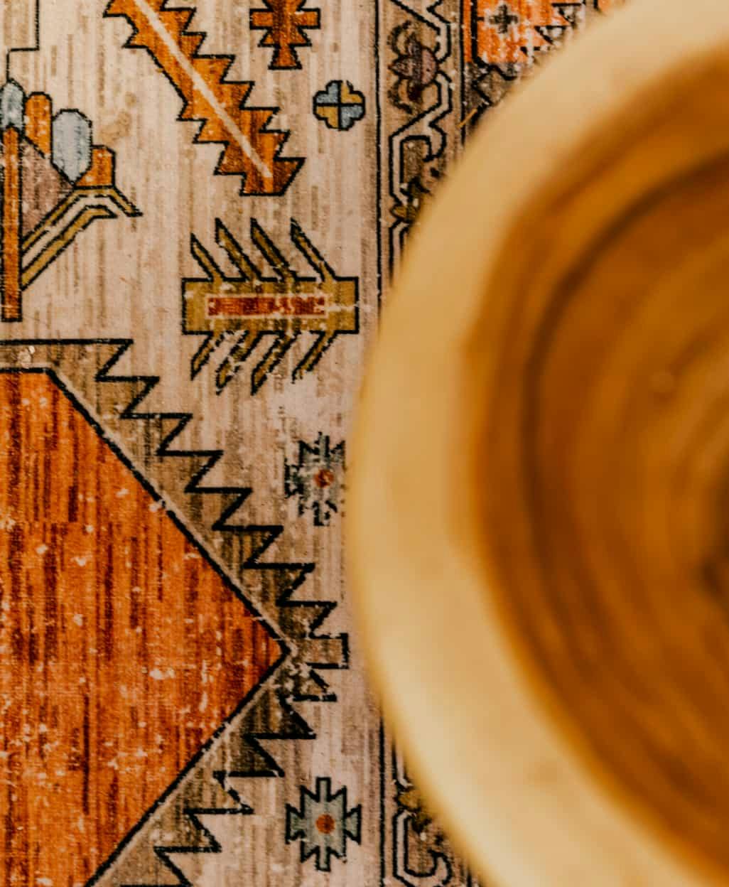A rug under a pot