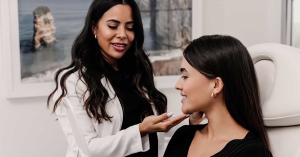 Doctor touching a patients face