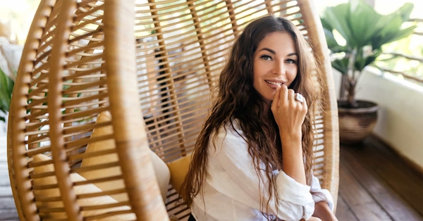 Woman sitting in a chair outdoors