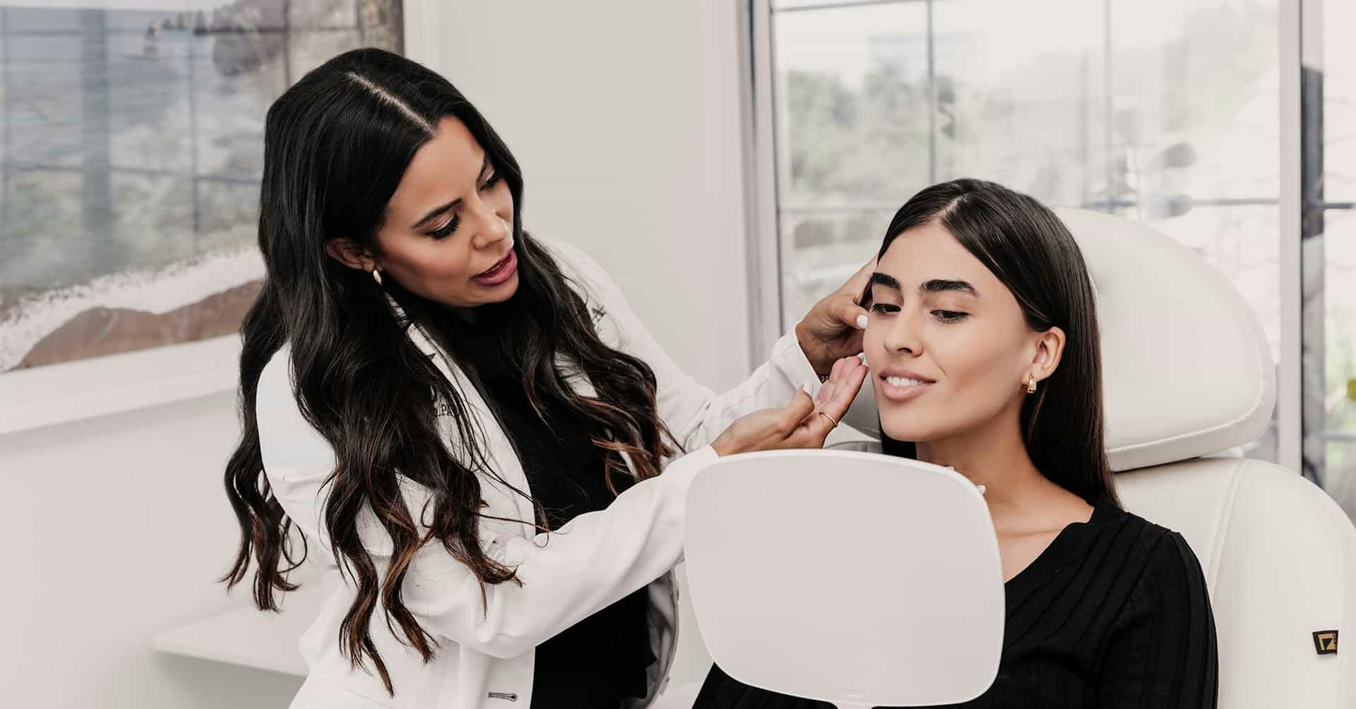 Doctor touching patients face