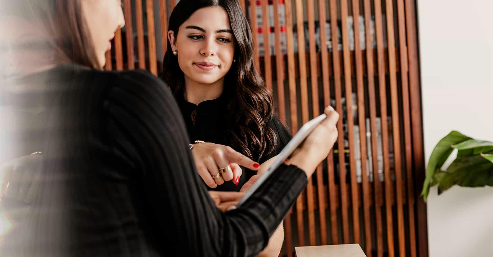 Woman pointing at documents