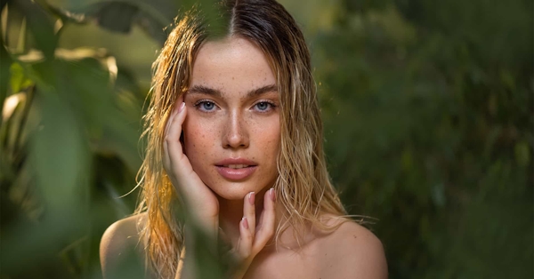 Close up of woman by plants