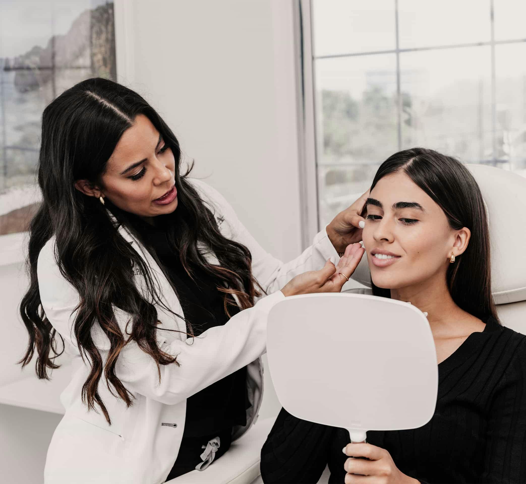 Doctor touching patients face