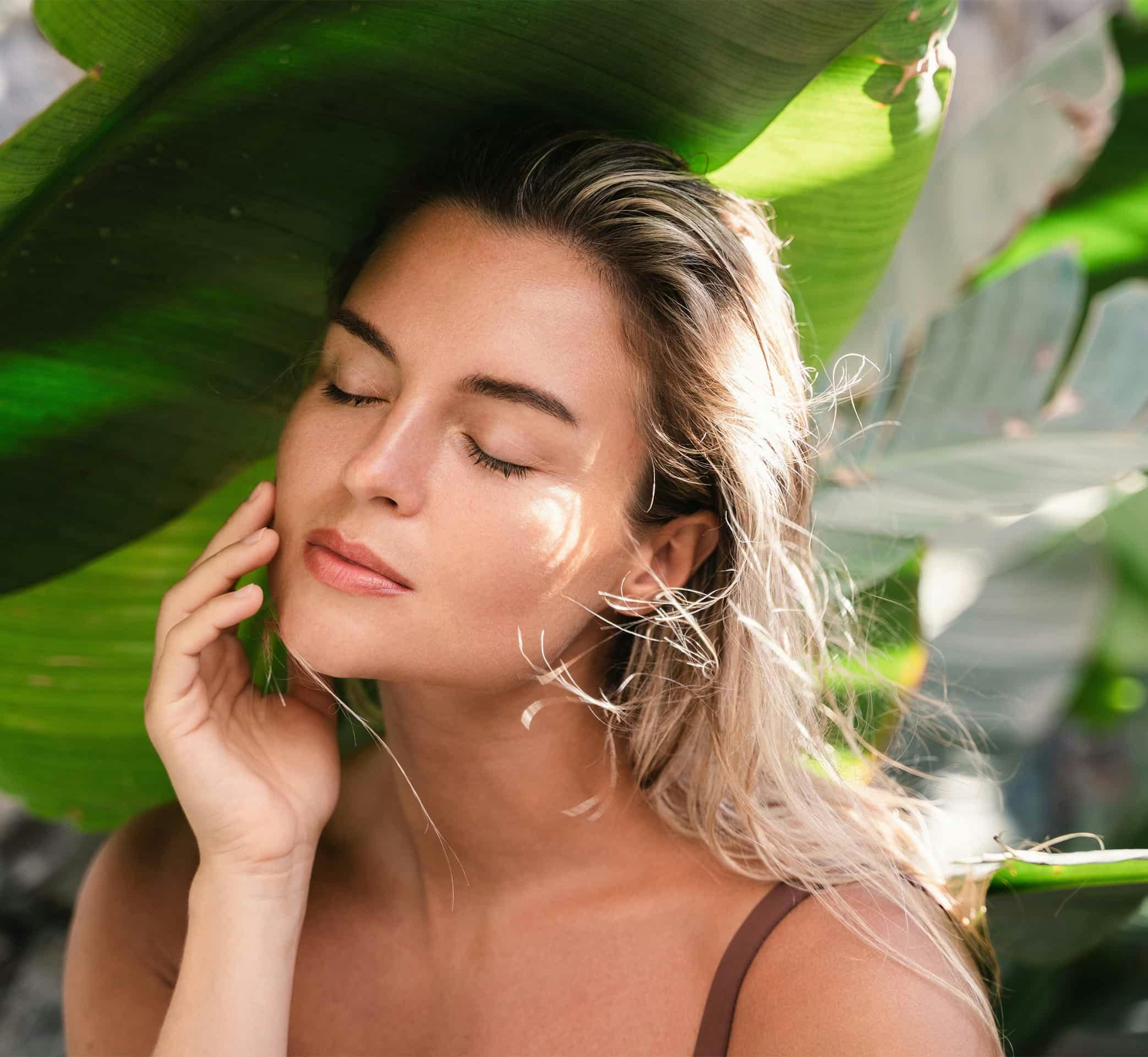 Close up of woman by plants