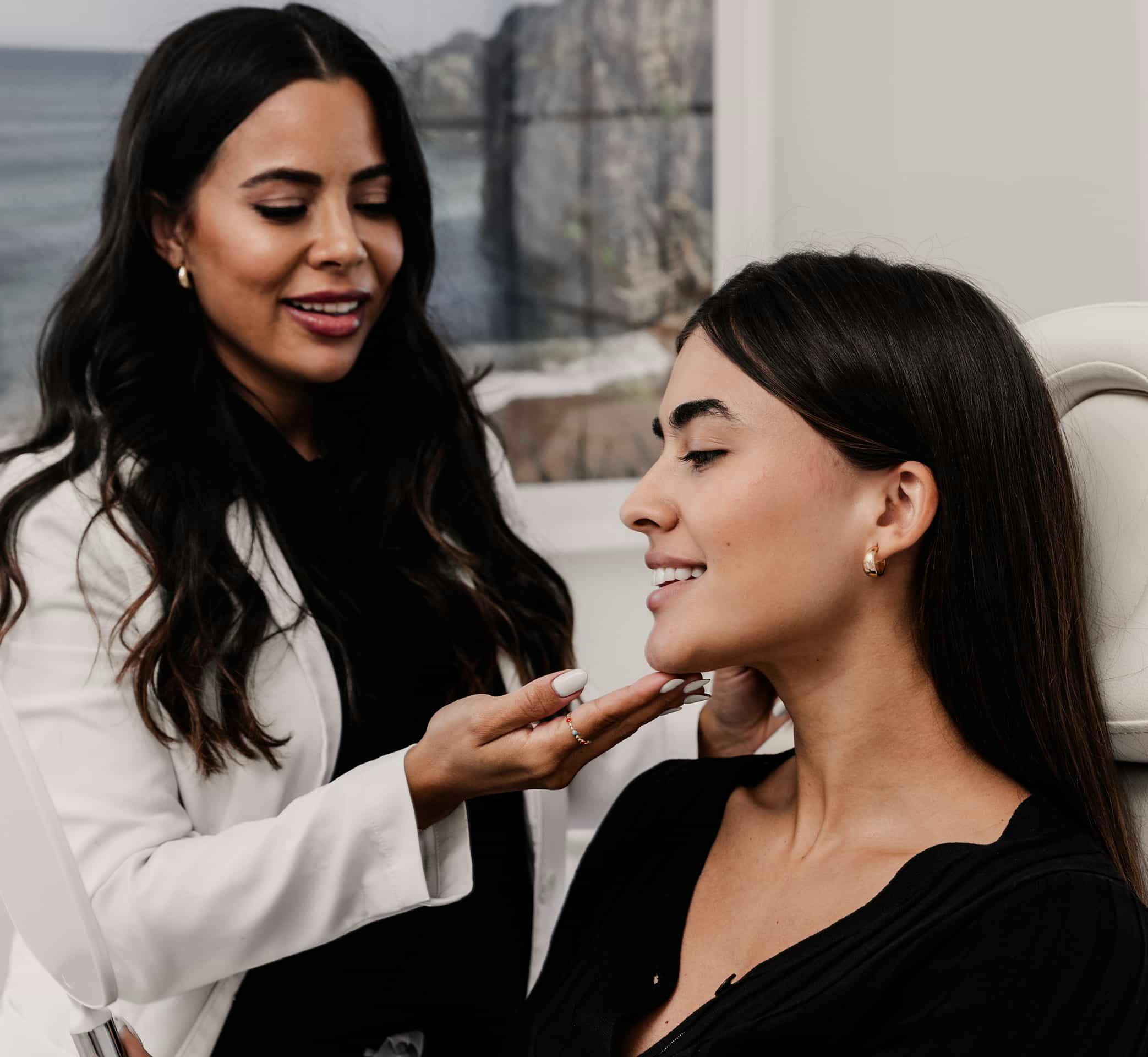 Doctor touching patients face