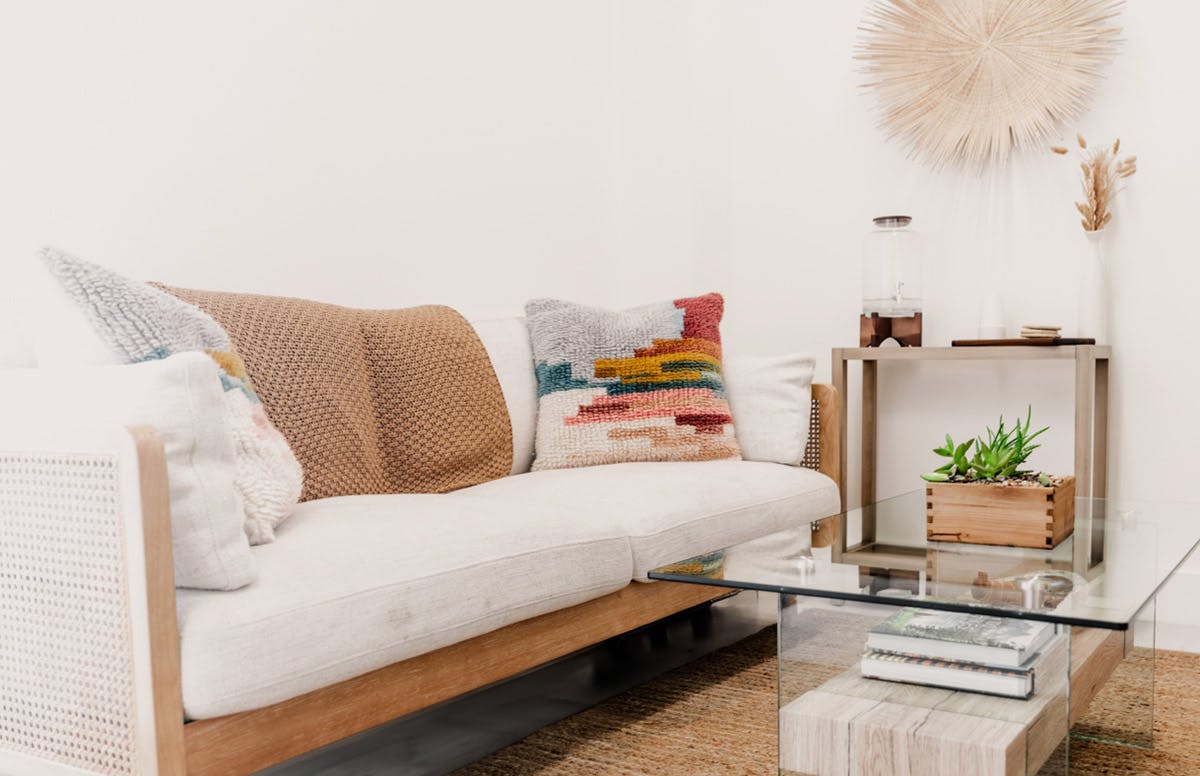 couch and a glass coffee table
