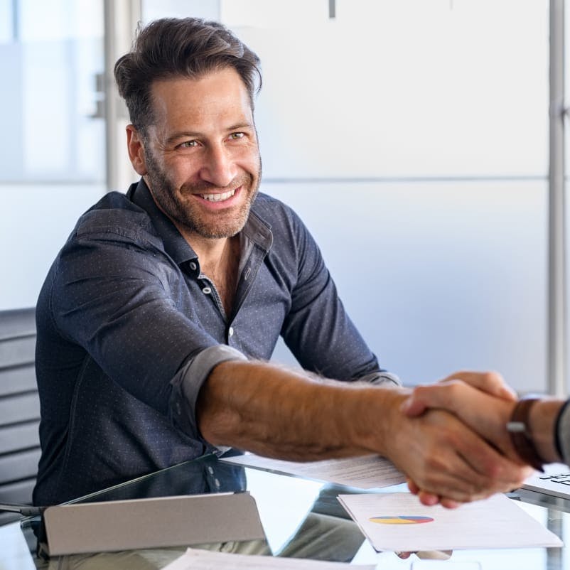 man shaking someones hand