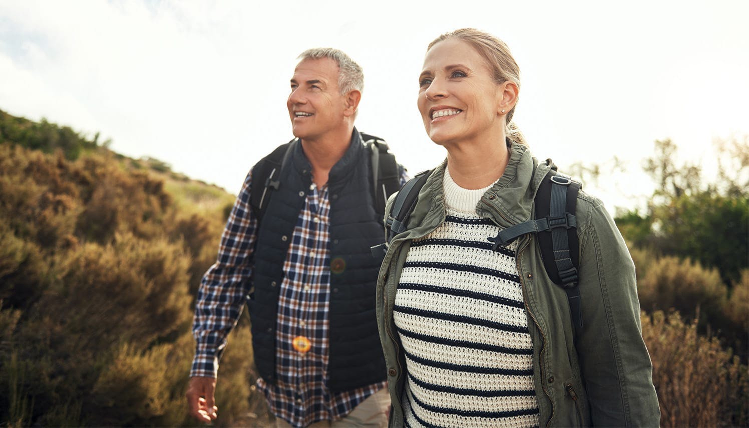 man and woman on a hike