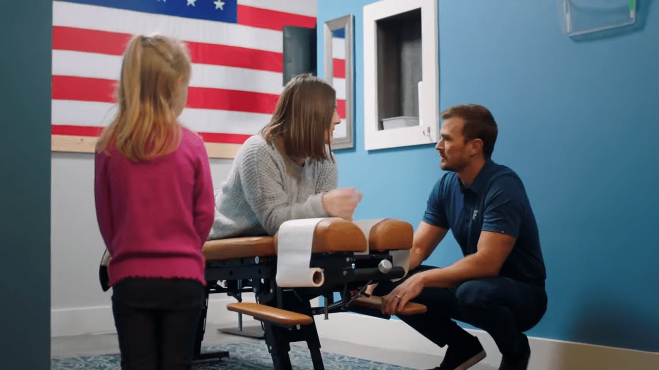 FreeForm Chiropractic staff with patient