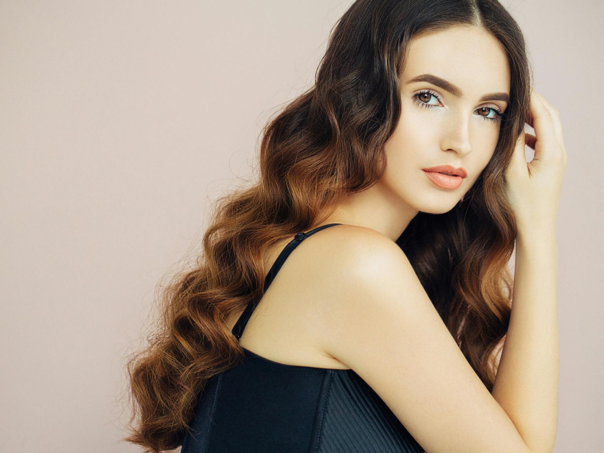 model posing with long wavy hair