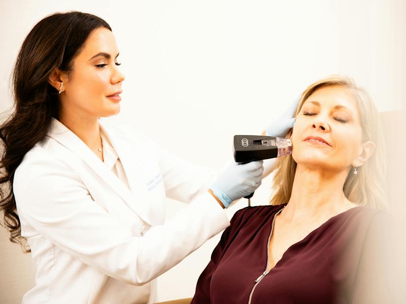 doctor doing microneedling to client