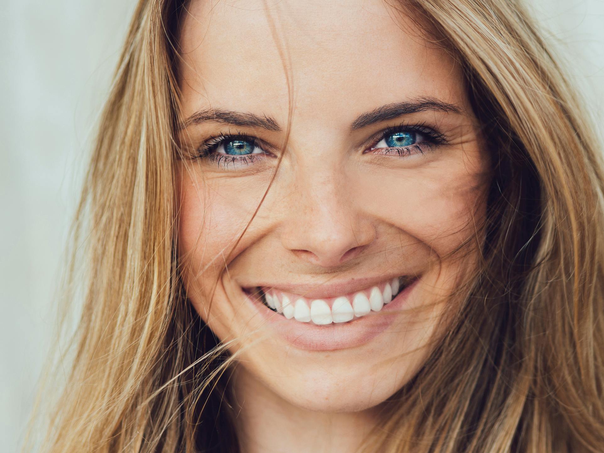 close up of a woman smiling