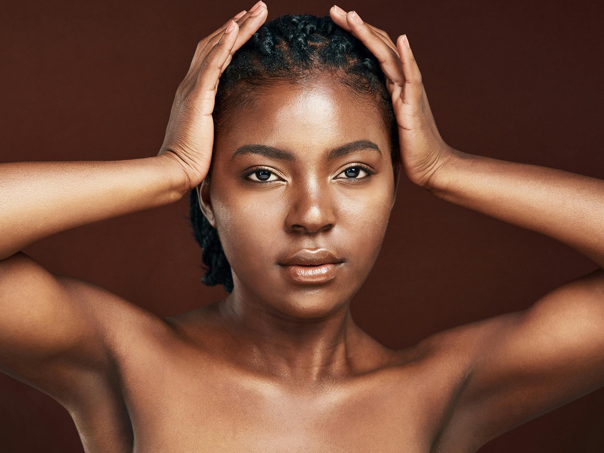 lady posing with hands on her head