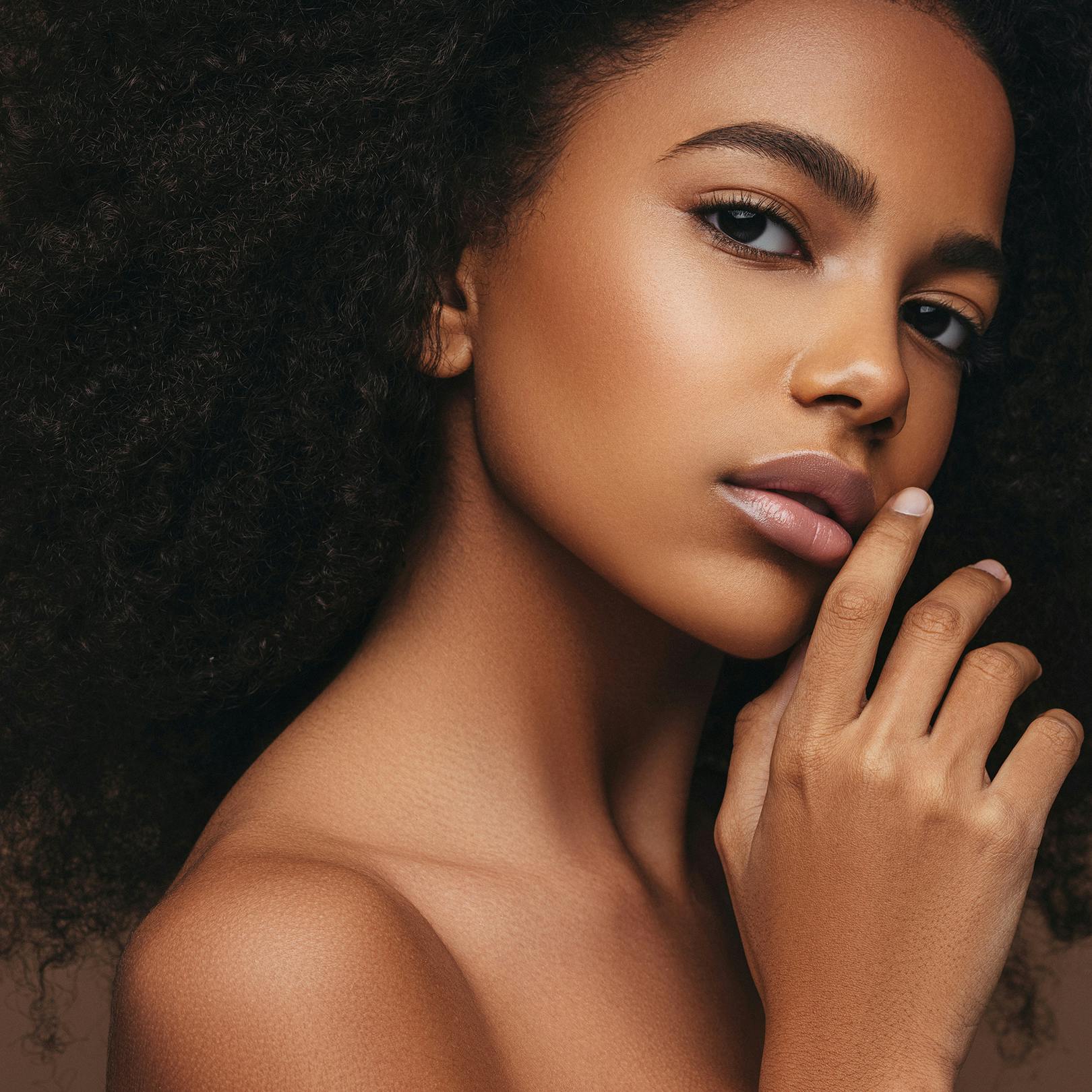 lady with shoulder out posing