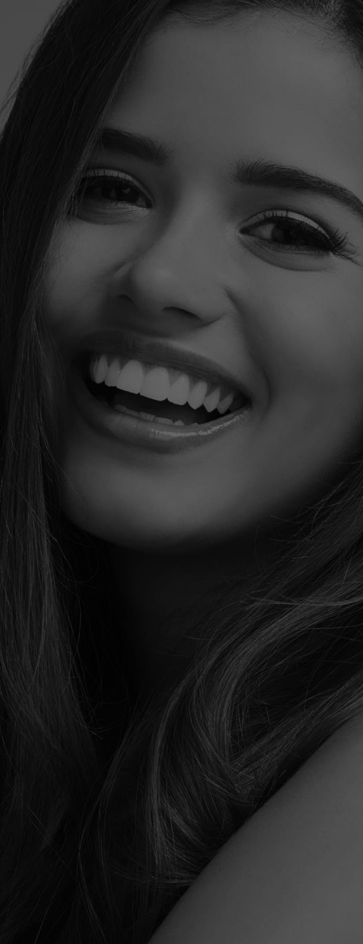 Woman smiling and showing her face
