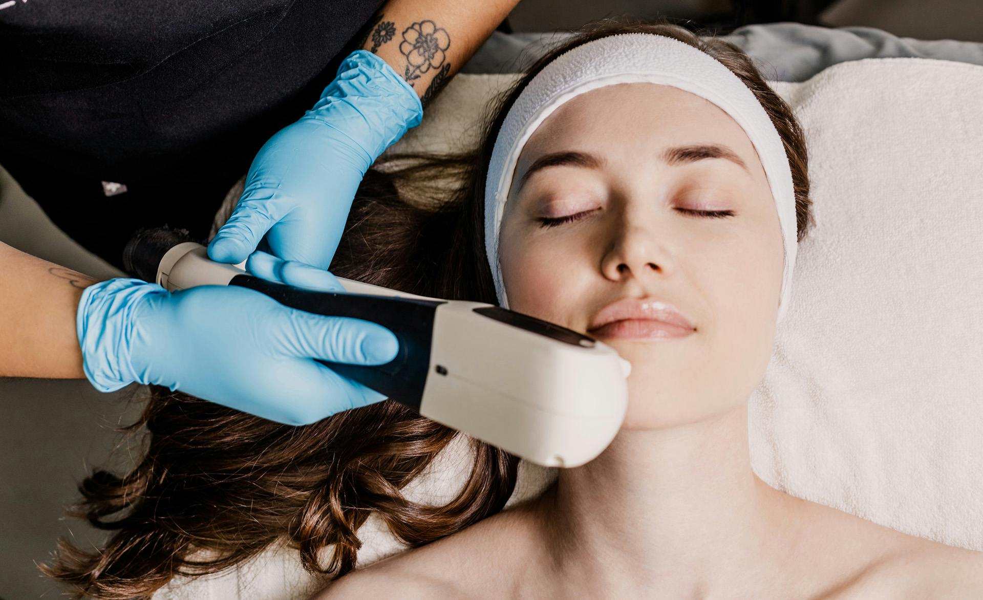 patient receiving facial treatment