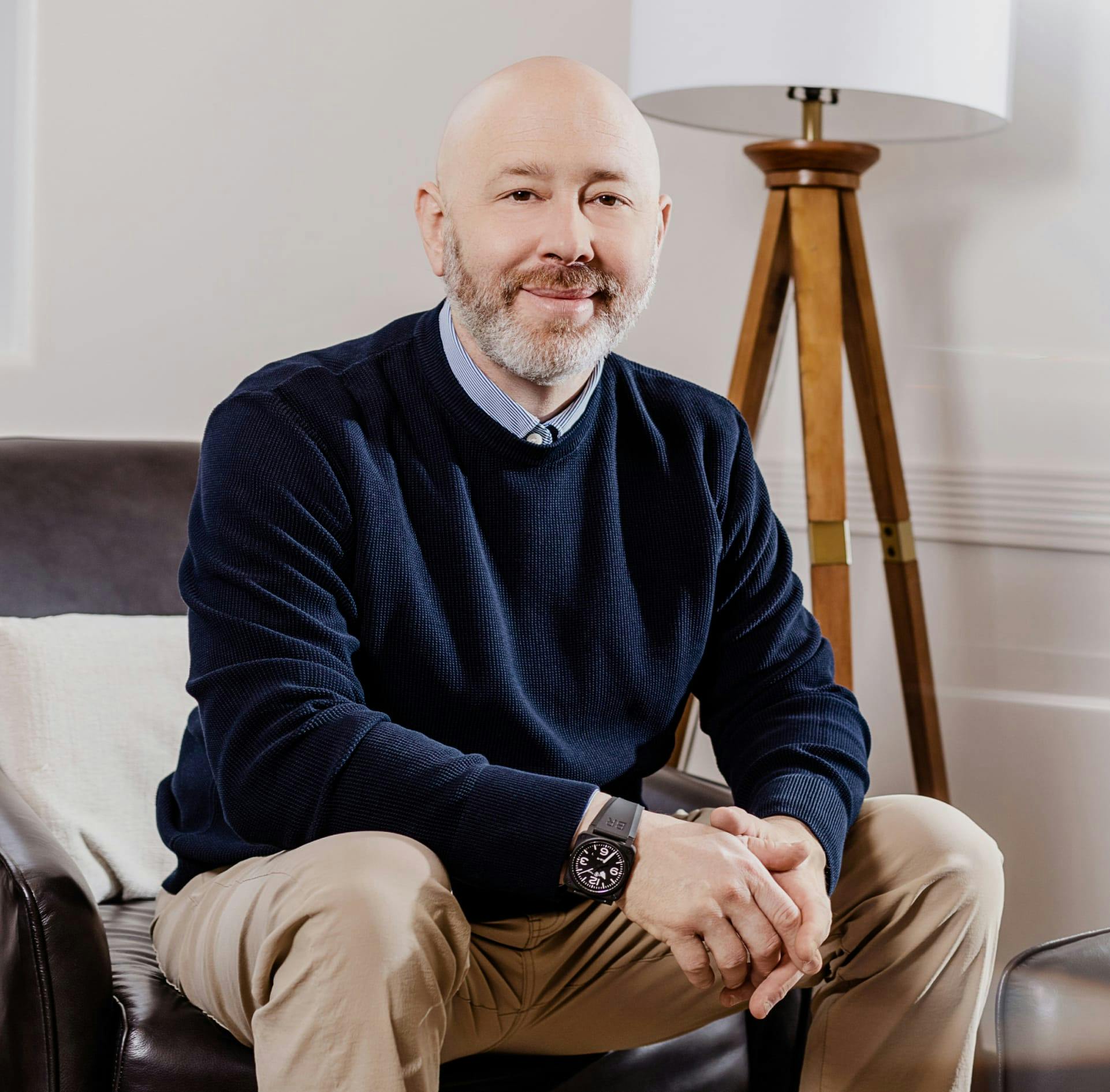 Dr. Michael Baumholtz sitting down