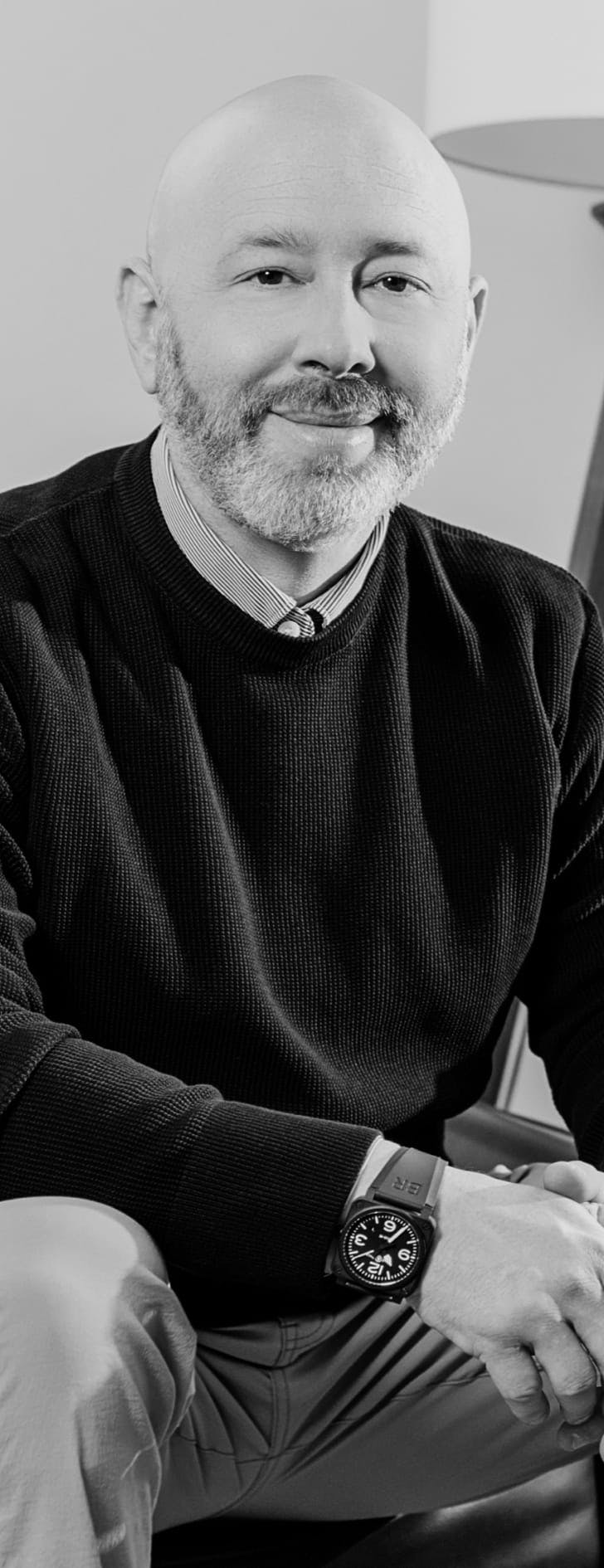 Dr. Michael Baumholtz sitting down