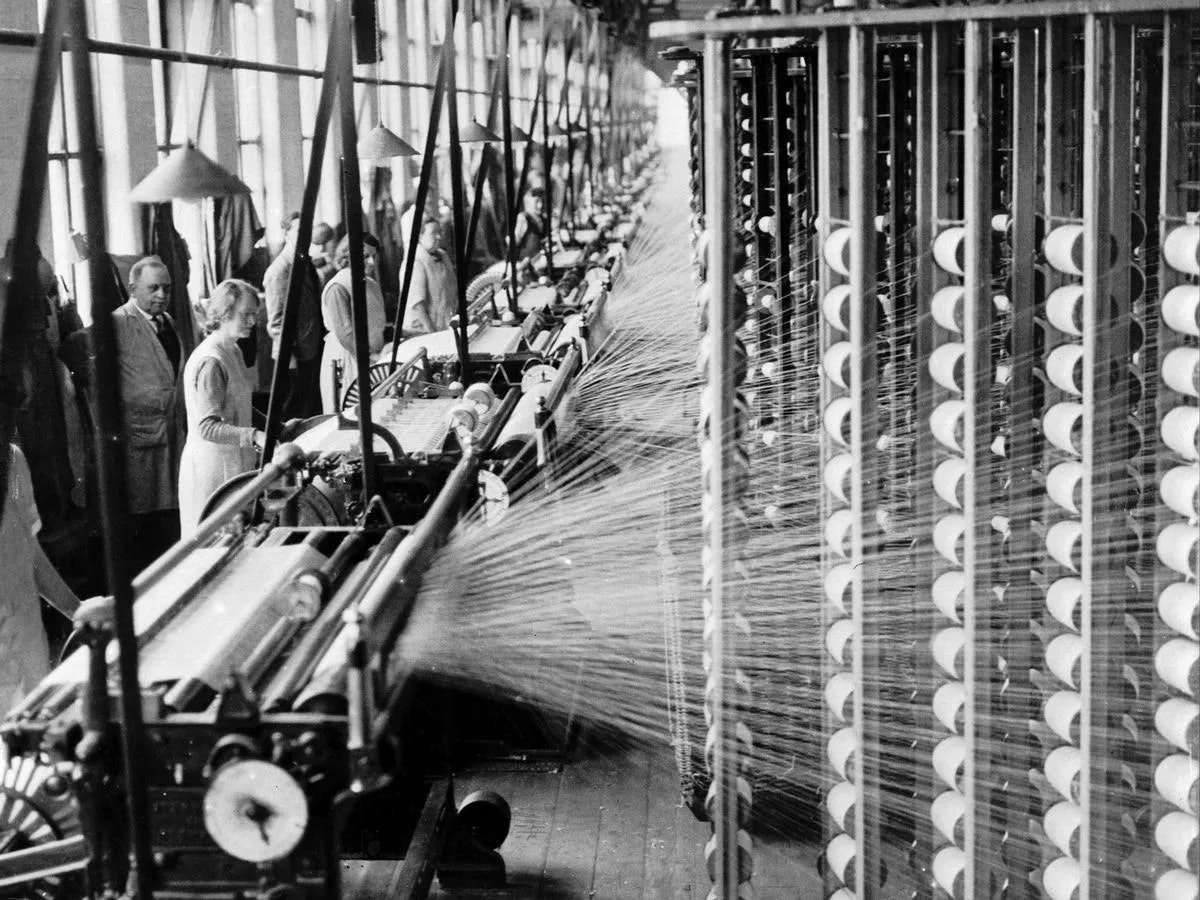 The interior of a similar mill, manufacturing textiles.