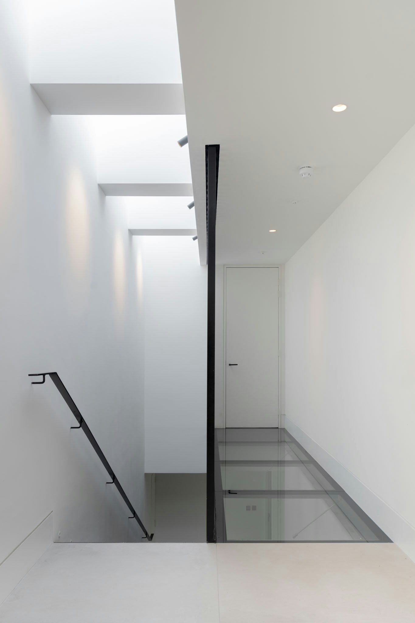 The Penthouse features a glass walkway and skylights | The Böhm Journal | Shot by Ella Wheatley | Stephenson Hamilton Risley Studio Architects | Quadrant, North Road