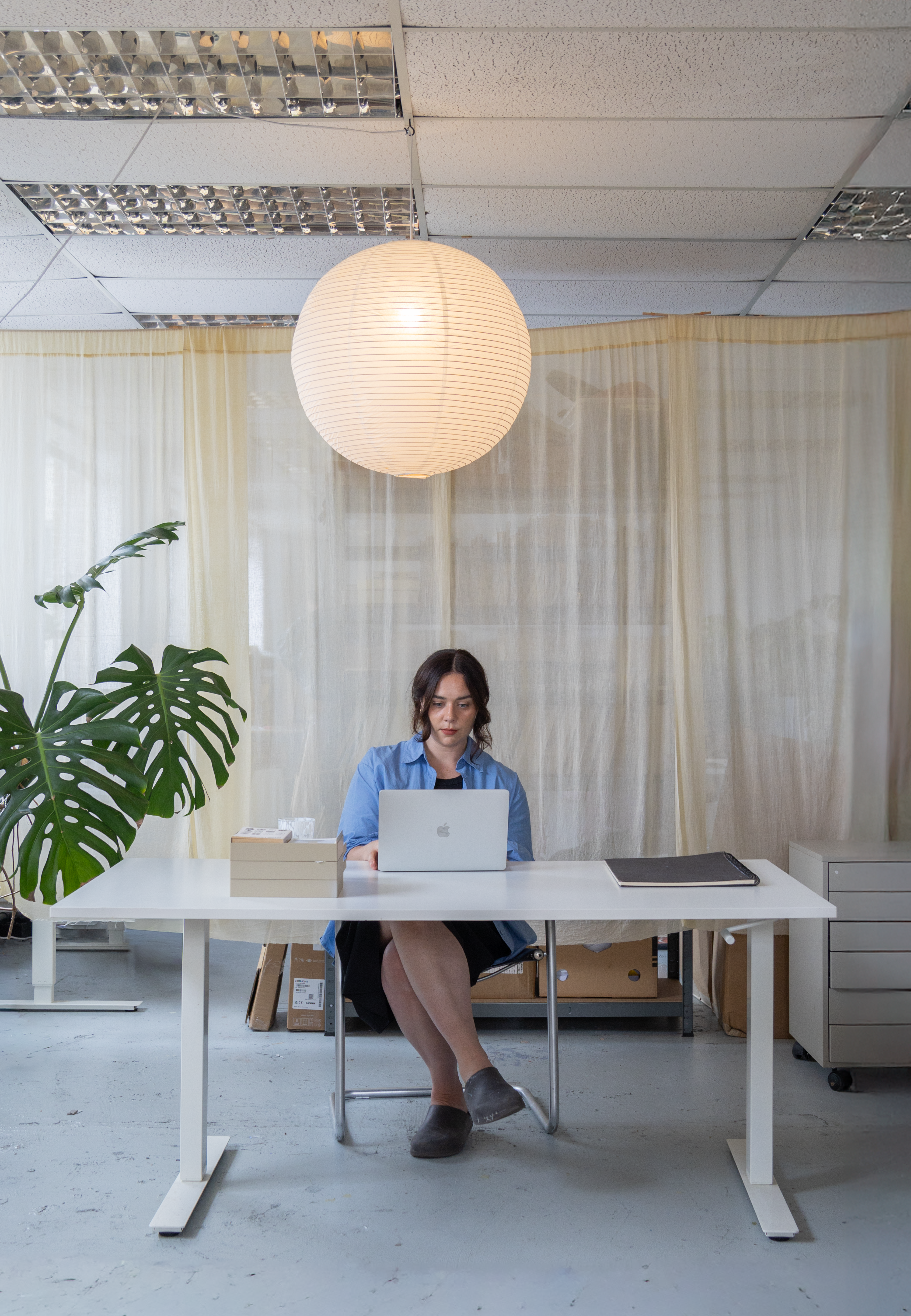 Laurie Maun's at work in her Stockport Art Studio, photographed by Ella Wheatley for Böhm, Design Led Estate Agent in Manchester.