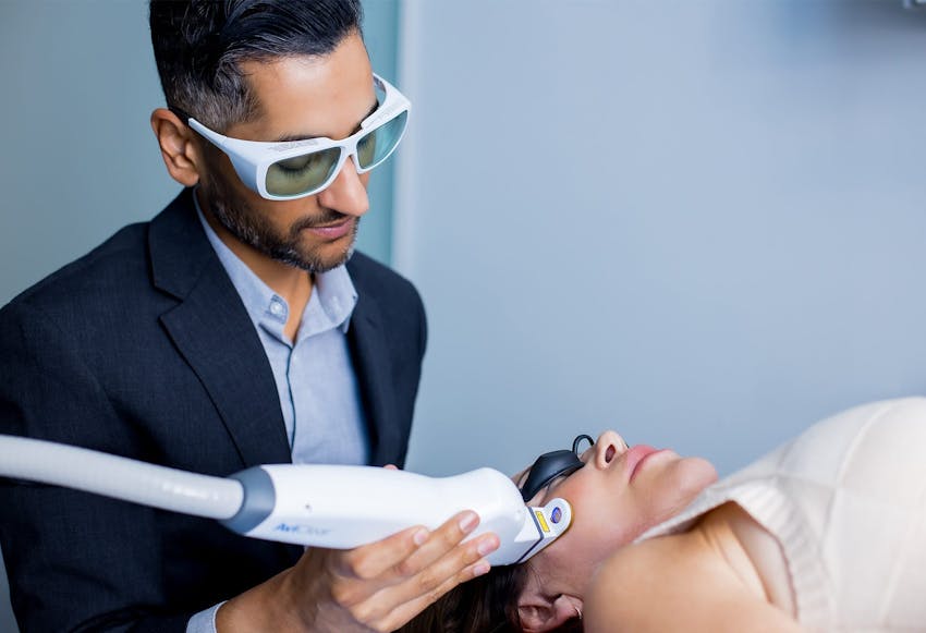 Dr. Tripathi with a patient